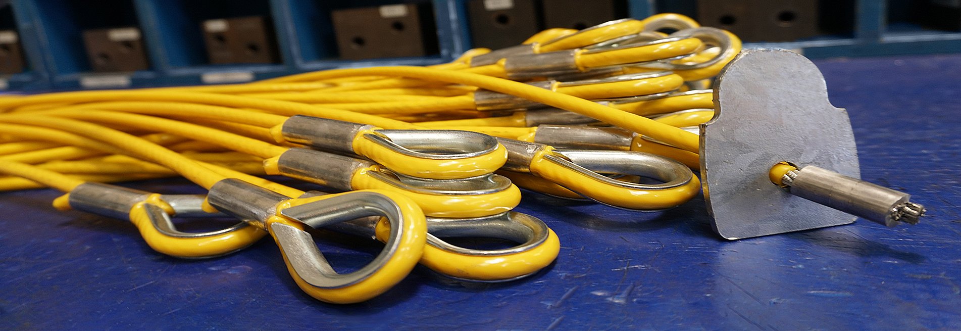 Bespoke coated wire rope assemblies